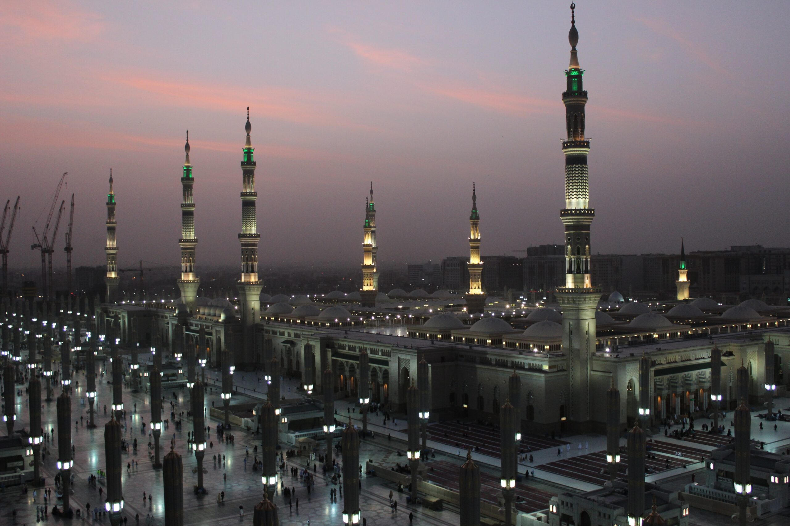 moon between two towers of the prophet s mosque in al madinah saudi arabia scaled